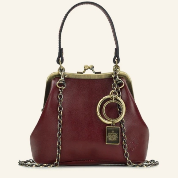 Patricia Nash Handbags - NWOT Patricia Nash Mini Laureana Crossbody Kisslock Bag with Charm